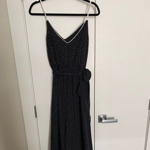 Black jumpsuit with mini white polkadots